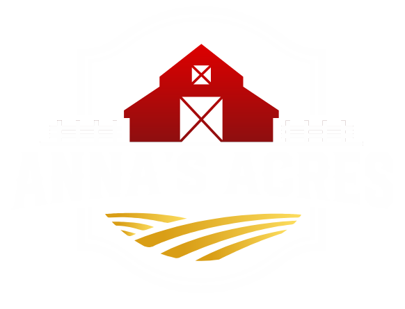 Anna's Acres logo featuring red barn